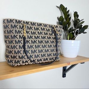 Michael Kors Black & Tan Purse with Gold hardware